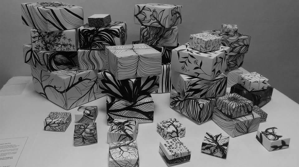 "The Gift of Poetry" installation, Iman Shaggag, 2015, hand made paper boxes with illustrations done using black Chines ink-  photo courtesy Ayman Alsir
